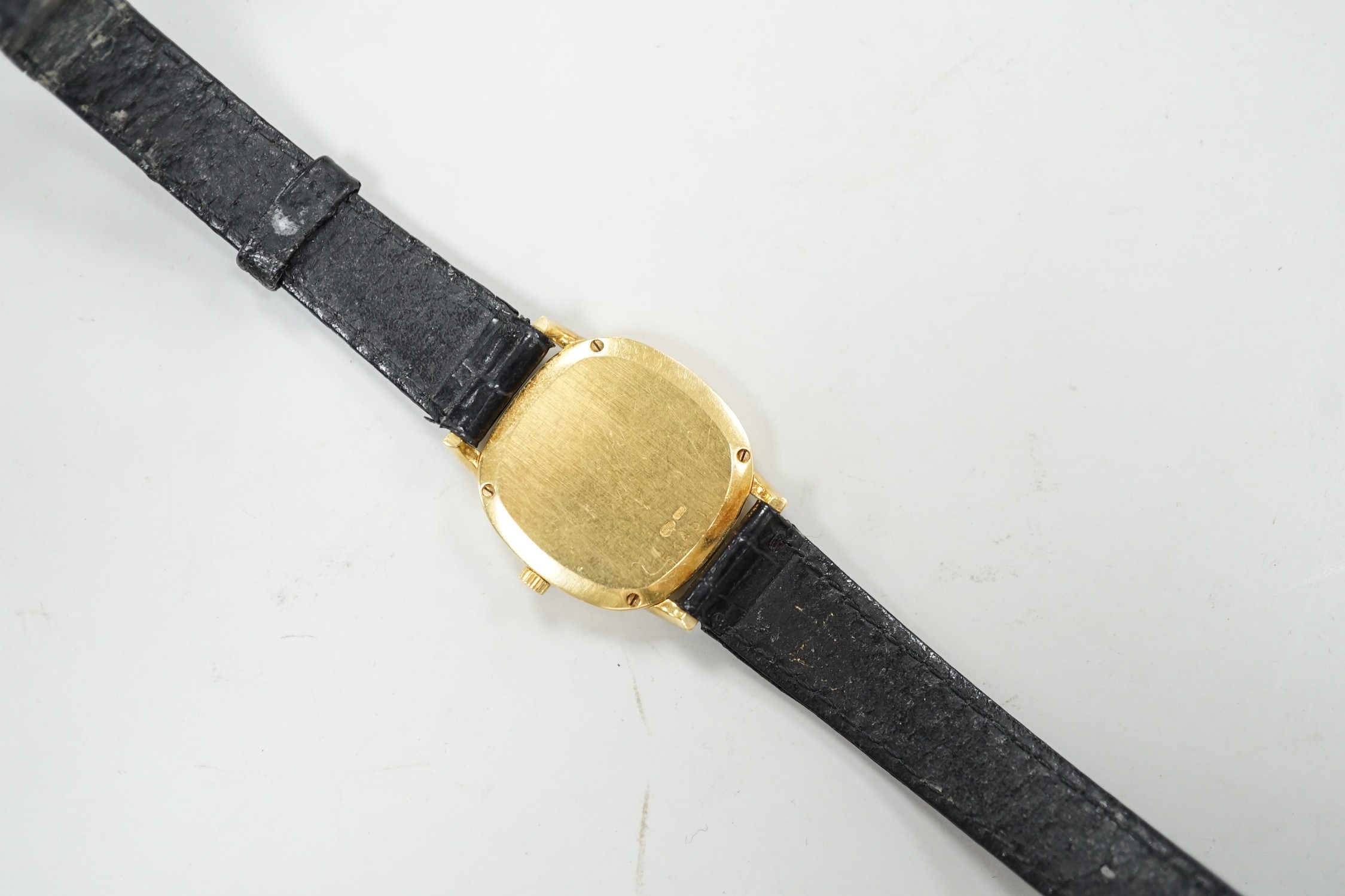 A lady's 18ct gold Vacheron & Constantin, manual wind wrist watch, on associated leather strap with 750 buckle, case diameter 23mm.